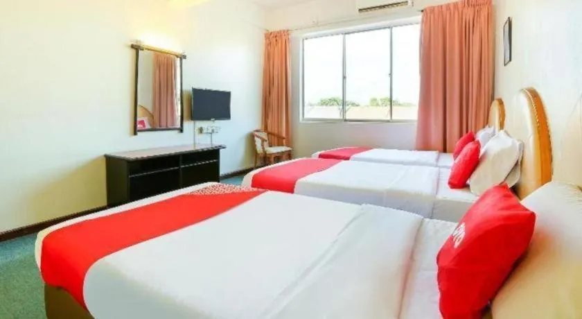 Bed in OYO 89638 Hotel Mandarin Inn