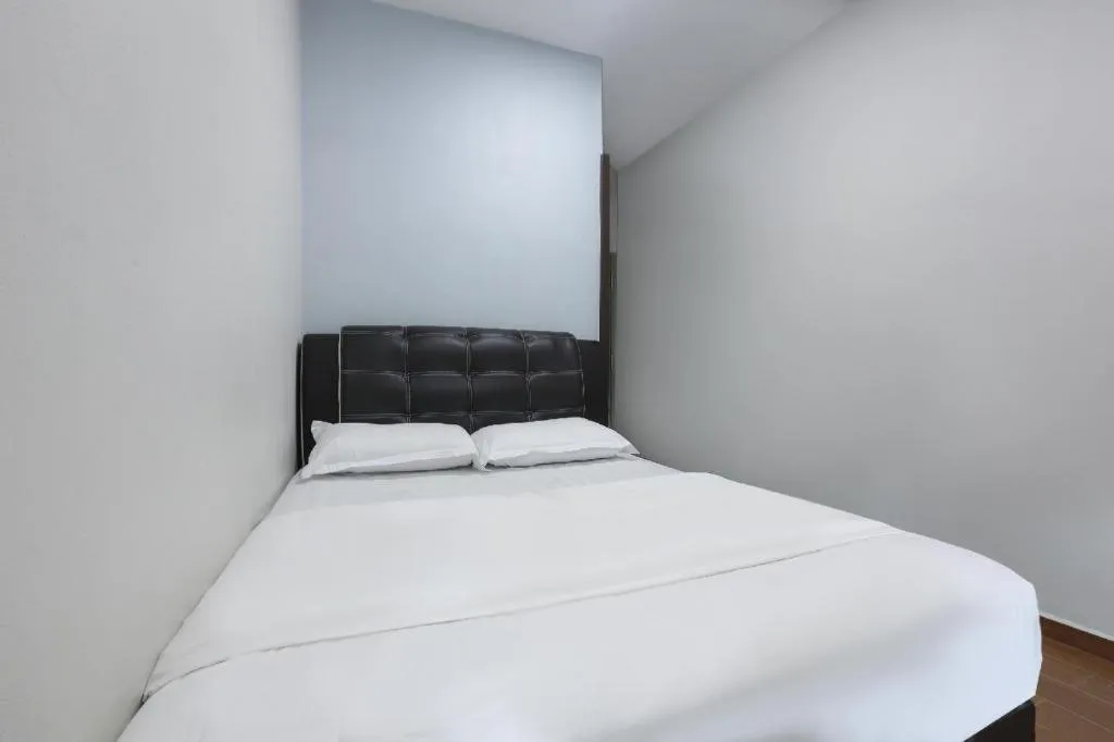 Bed in OYO 89859 PP Traveller's Hotel