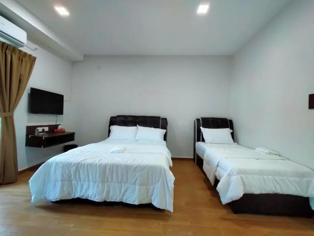 Bed in OYO 89859 PP Traveller's Hotel