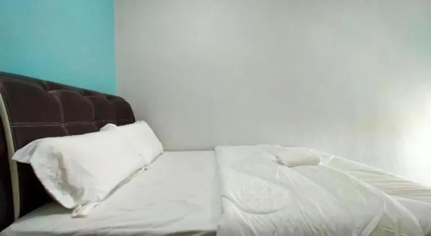 Bed in OYO 89859 PP Traveller's Hotel