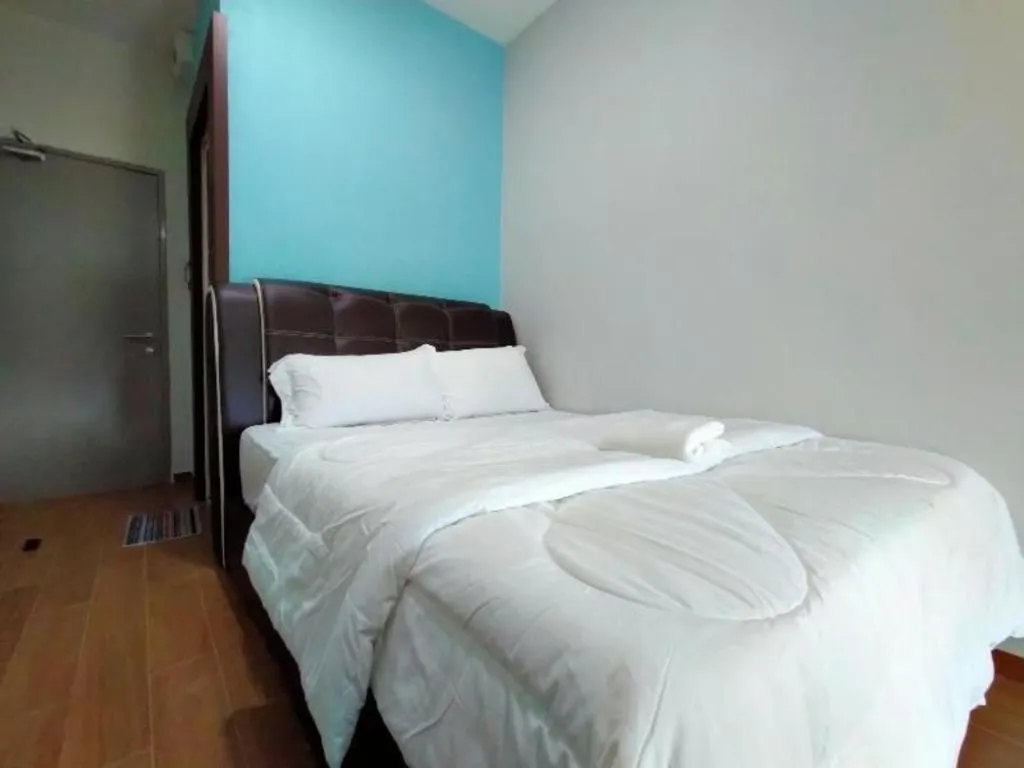 Bed in OYO 89859 PP Traveller's Hotel