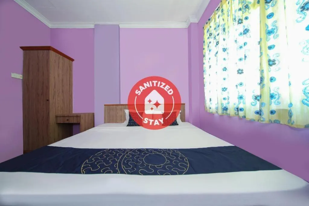 Bed in Capital O 89876 Safari Hotel