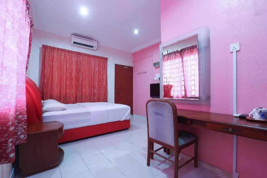 Bed in OYO 89892 Hotel Jeli Inn