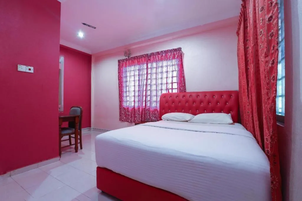 Bed in OYO 89892 Hotel Jeli Inn