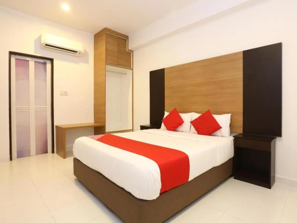 Bed in OYO 89888 DZ Residence Guest House