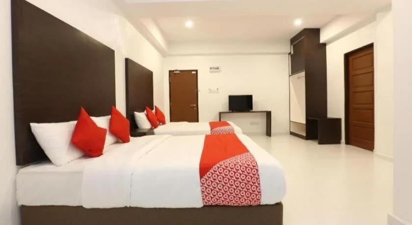 Bed in OYO 89888 DZ Residence Guest House