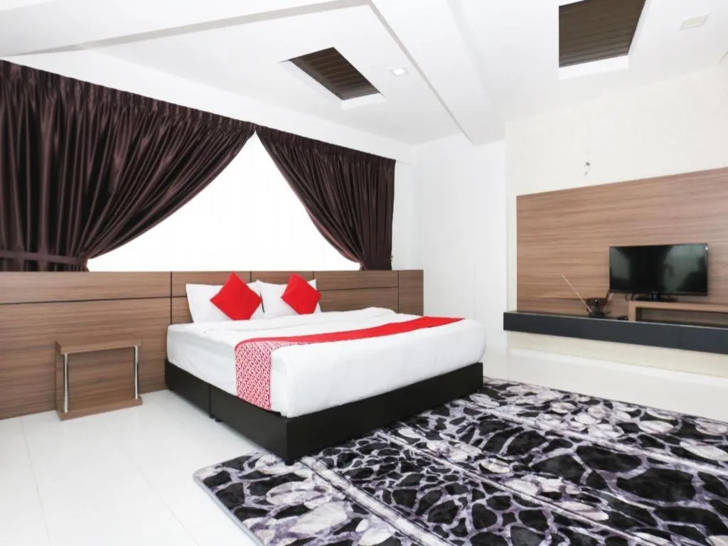 Bed in OYO 89888 DZ Residence Guest House