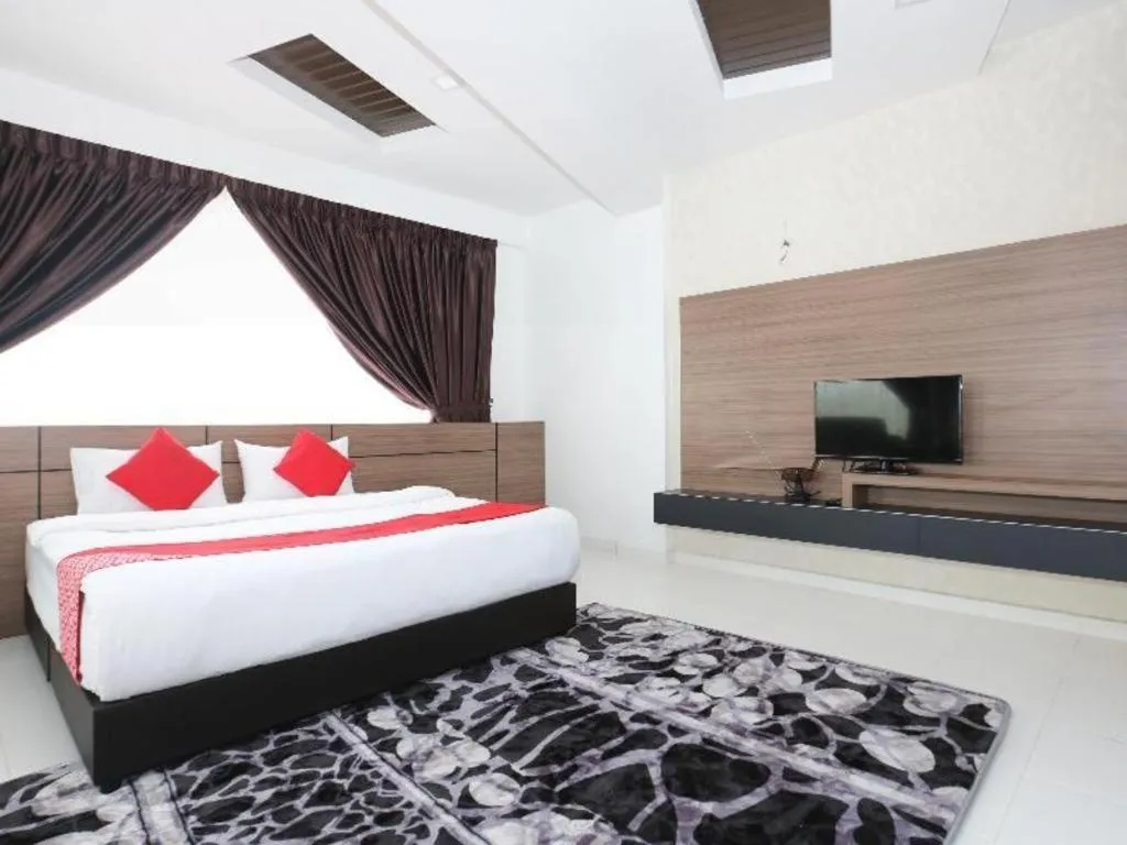 Bed in OYO 89888 DZ Residence Guest House