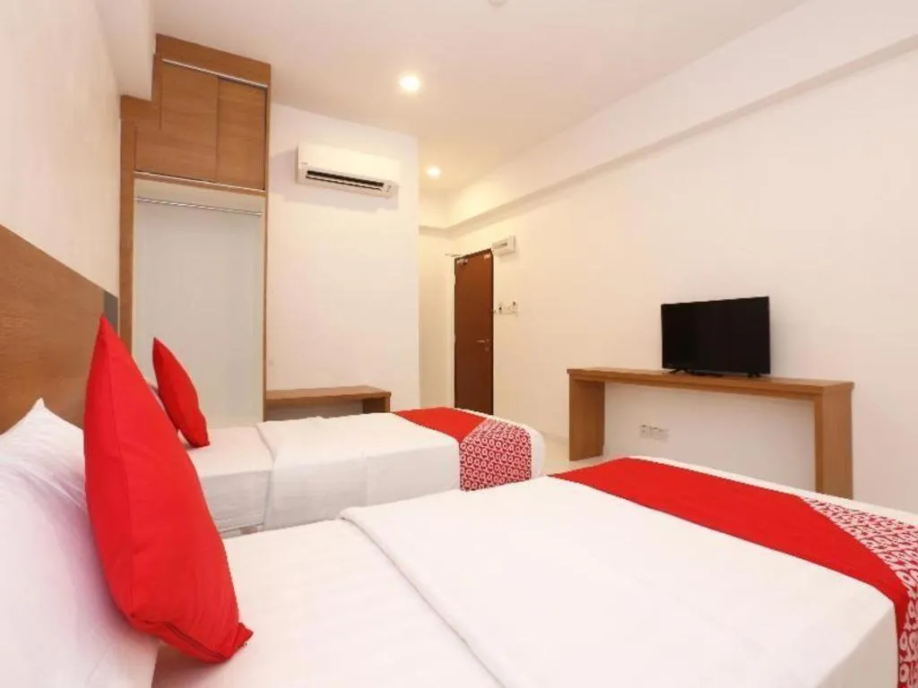 Bed in OYO 89888 DZ Residence Guest House