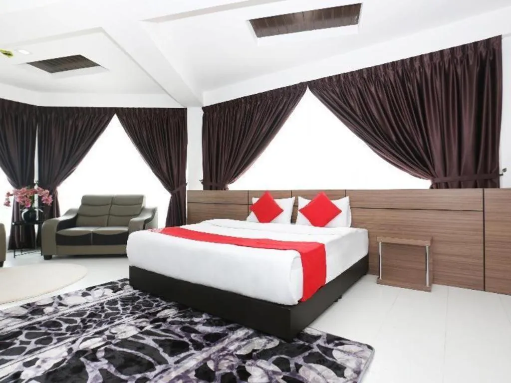 Bed in OYO 89888 DZ Residence Guest House