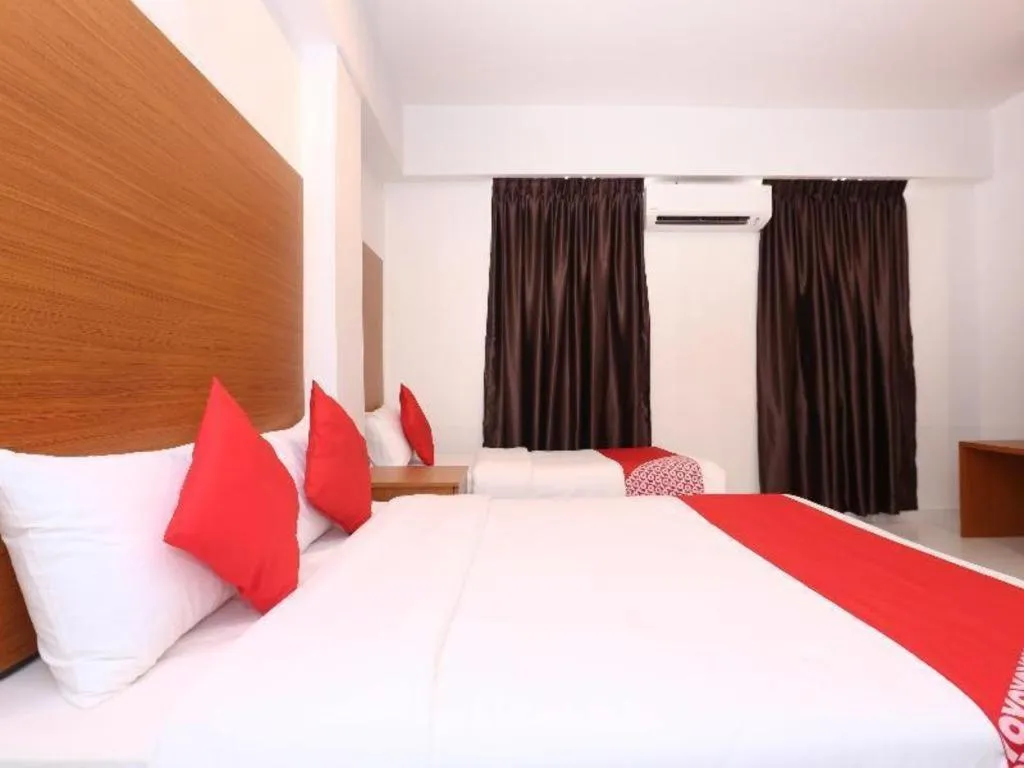 Bed in OYO 89888 DZ Residence Guest House