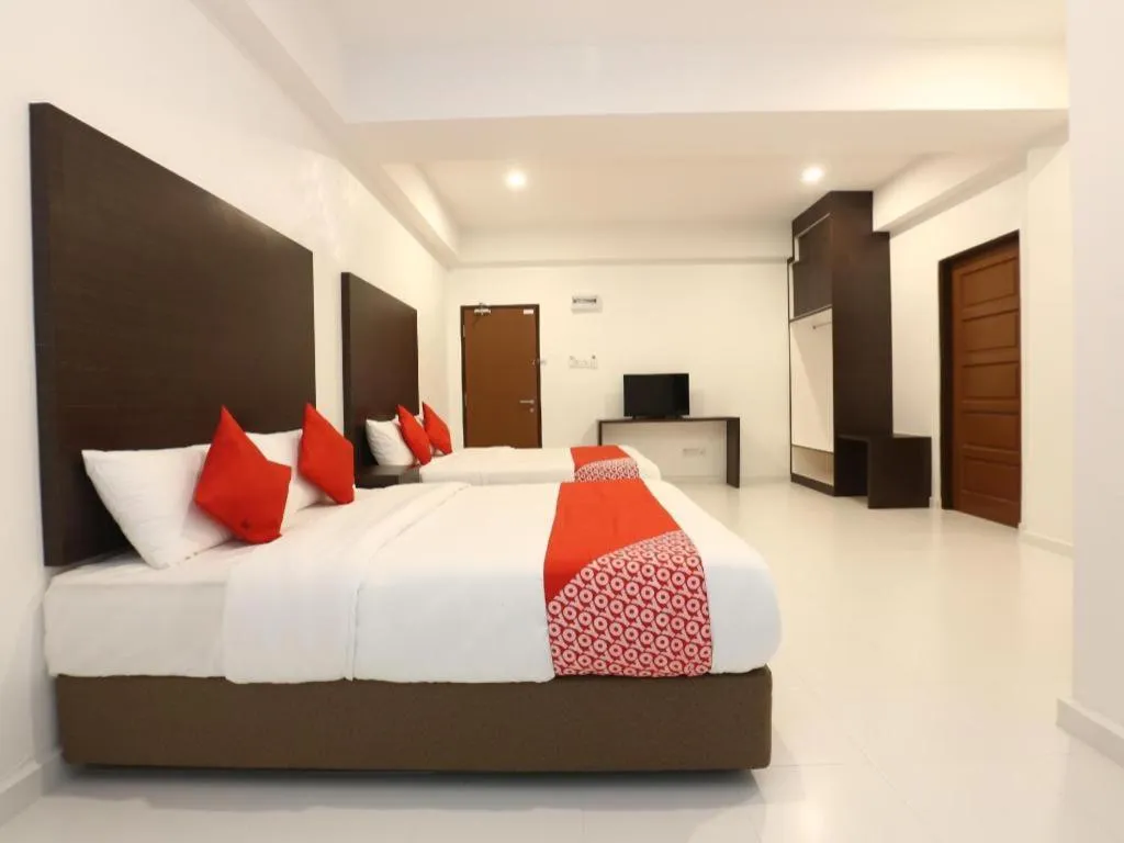 Bed in OYO 89888 DZ Residence Guest House