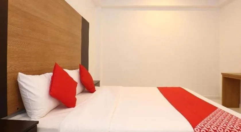 Bed in OYO 89888 DZ Residence Guest House
