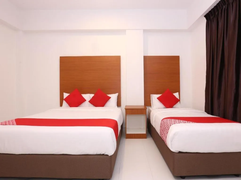Bed in OYO 89888 DZ Residence Guest House