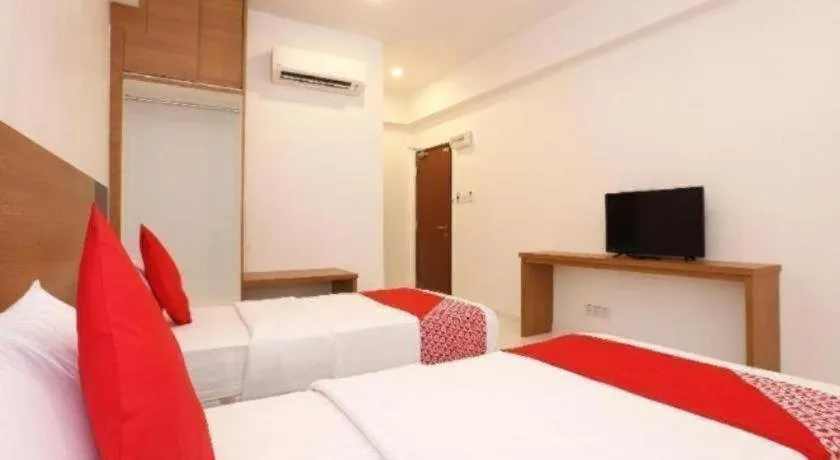 Bed in OYO 89888 DZ Residence Guest House