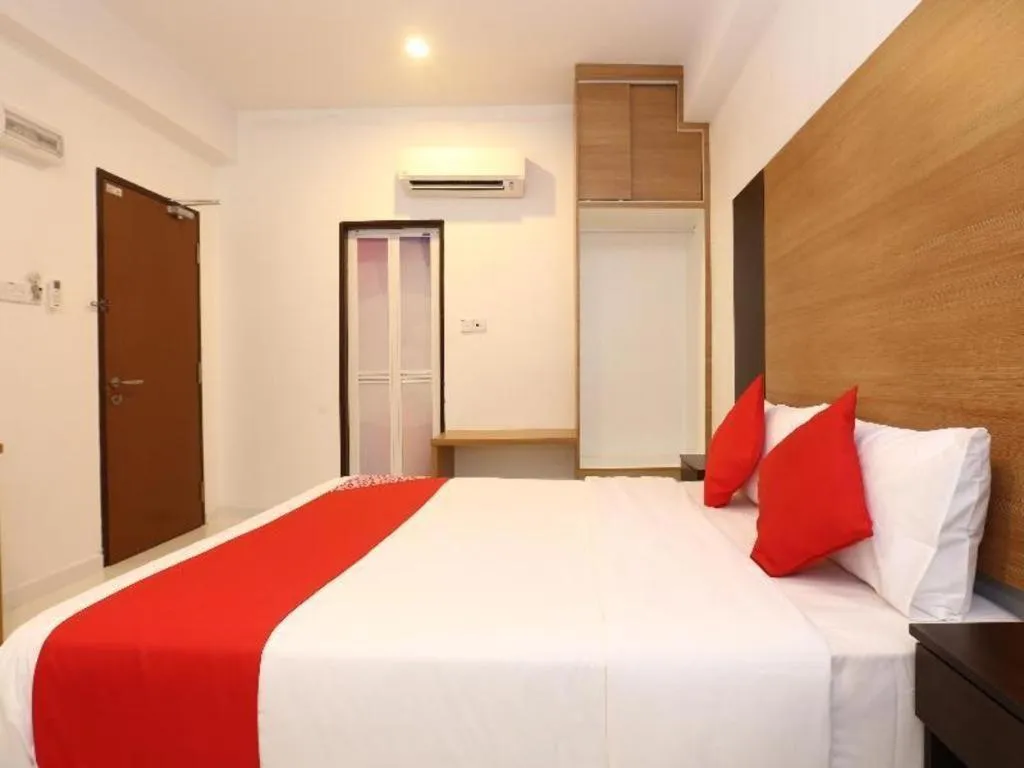 Bed in OYO 89888 DZ Residence Guest House