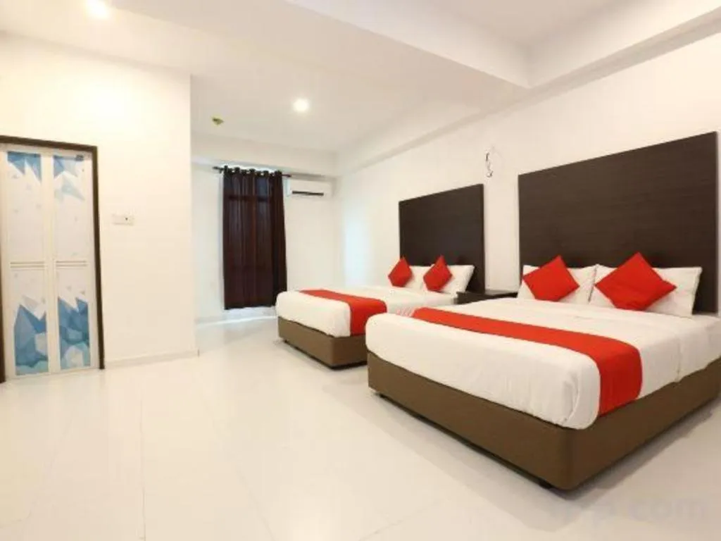 Bed in OYO 89888 DZ Residence Guest House