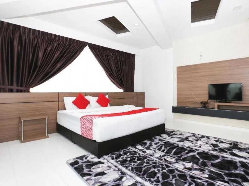 Bed in OYO 89888 DZ Residence Guest House