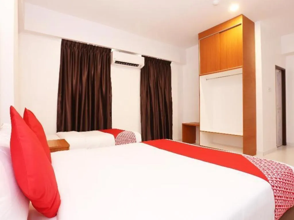 Bed in OYO 89888 DZ Residence Guest House