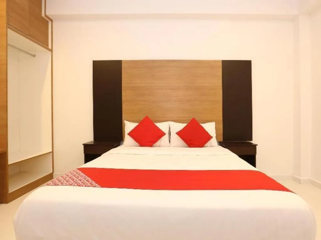 Bed in OYO 89888 DZ Residence Guest House