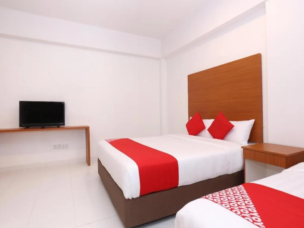Bed in OYO 89888 DZ Residence Guest House