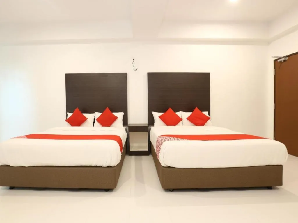 Bed in OYO 89888 DZ Residence Guest House