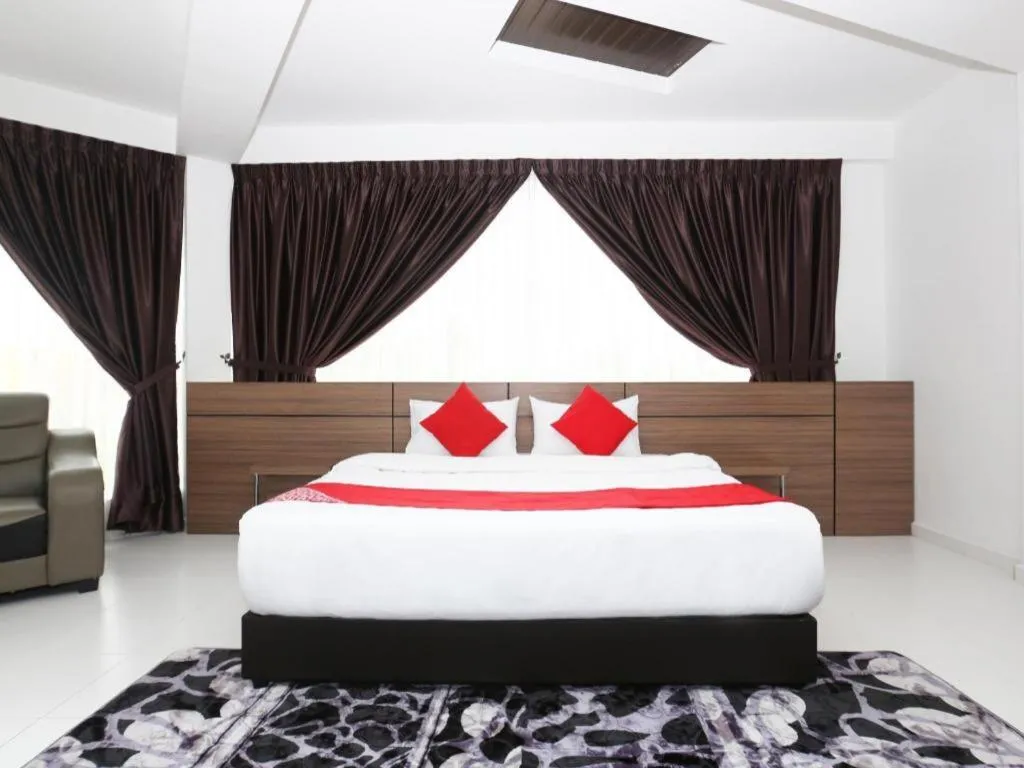 Bed in OYO 89888 DZ Residence Guest House