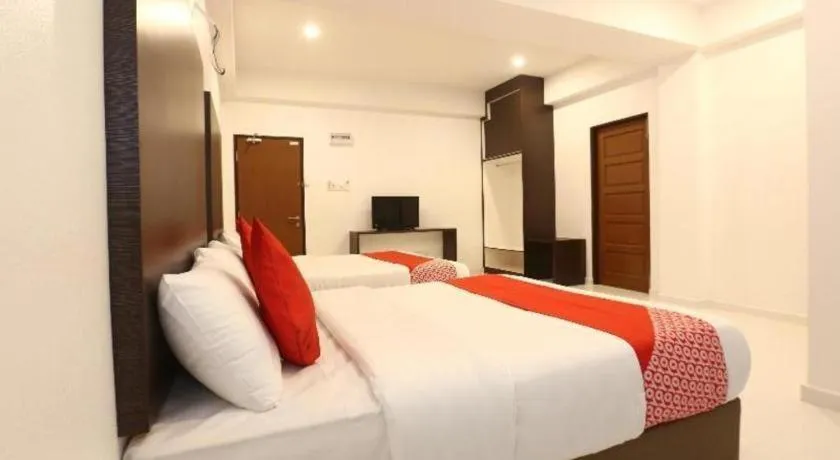 Bed in OYO 89888 DZ Residence Guest House