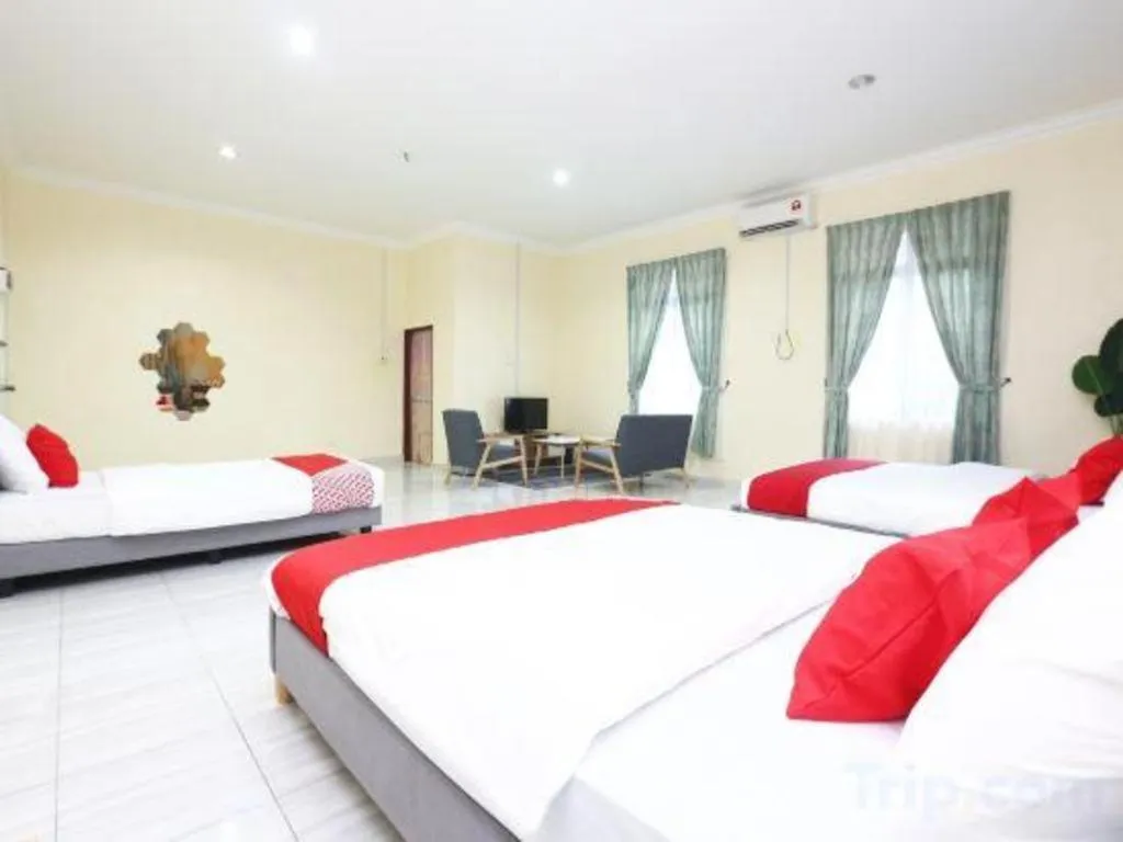 Bed in OYO 89607 Aloha Chalet