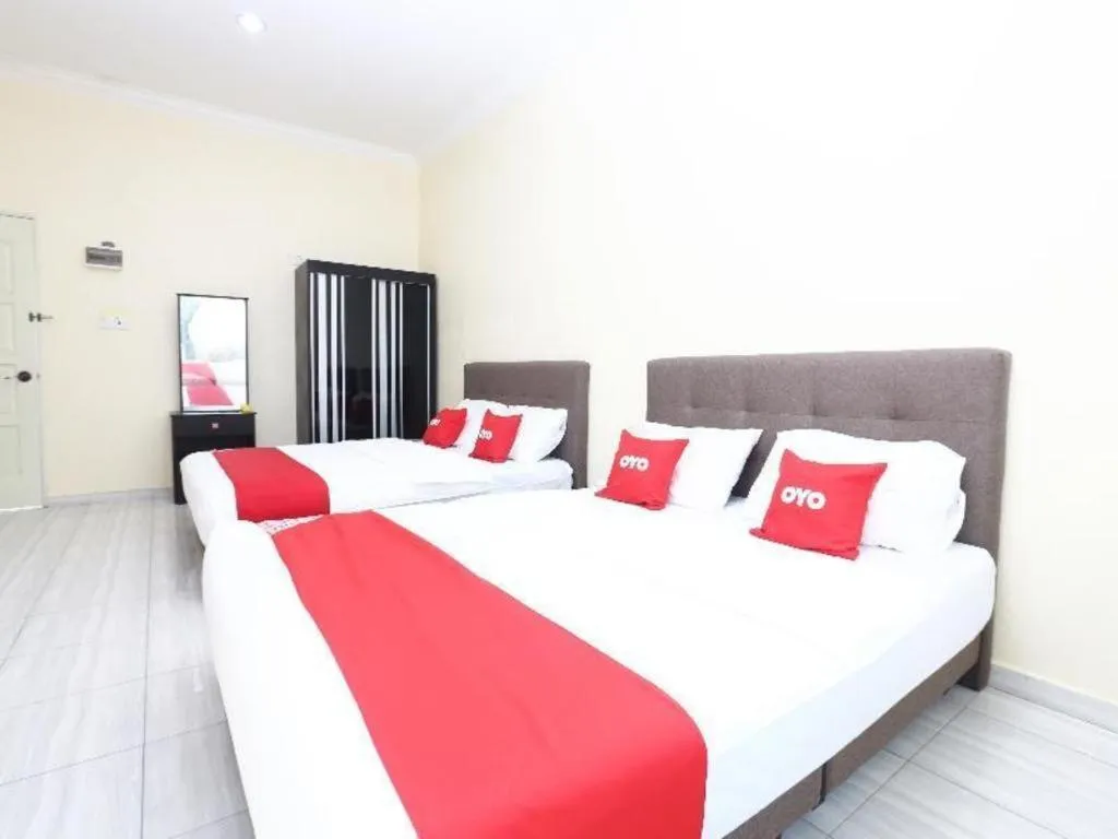 Bed in OYO 89607 Aloha Chalet