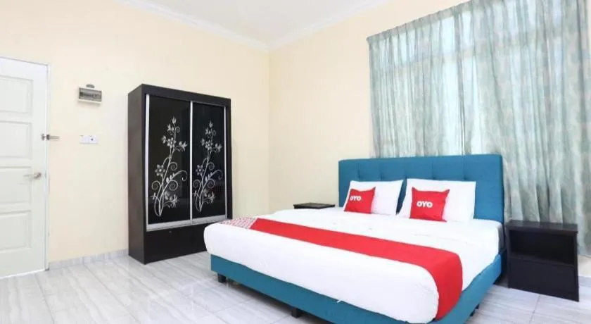 Bed in OYO 89607 Aloha Chalet