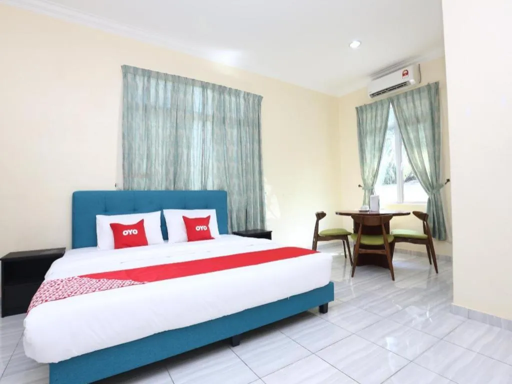 Bed in OYO 89607 Aloha Chalet