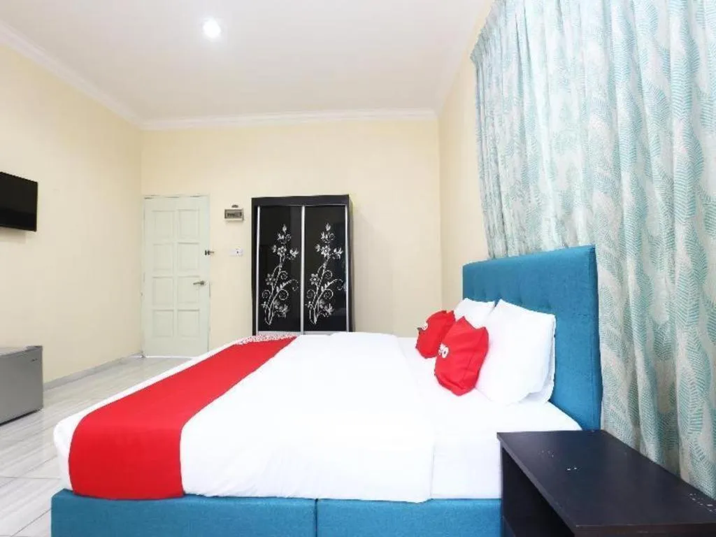 Bed in OYO 89607 Aloha Chalet