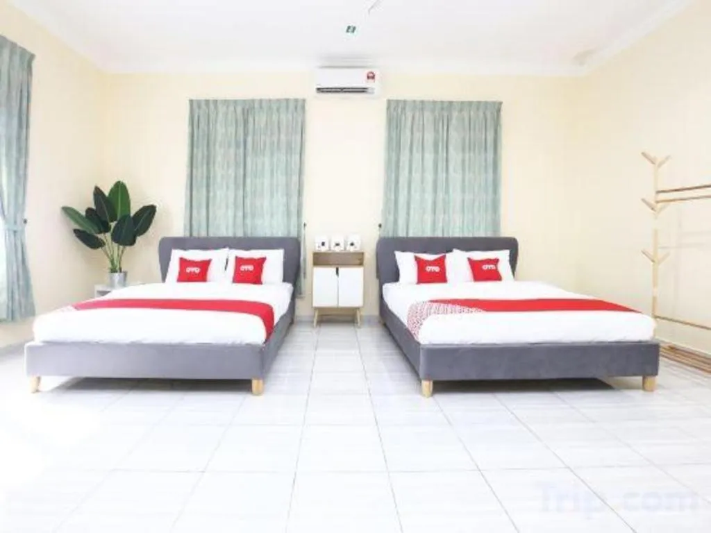 Bed in OYO 89607 Aloha Chalet