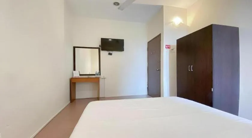 Bed in SPOT ON 91178 Motel Impian