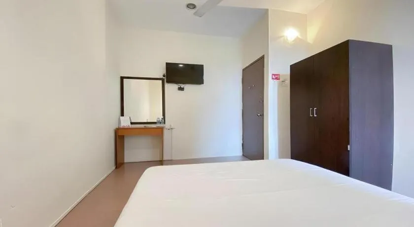 Bed in SPOT ON 91178 Motel Impian