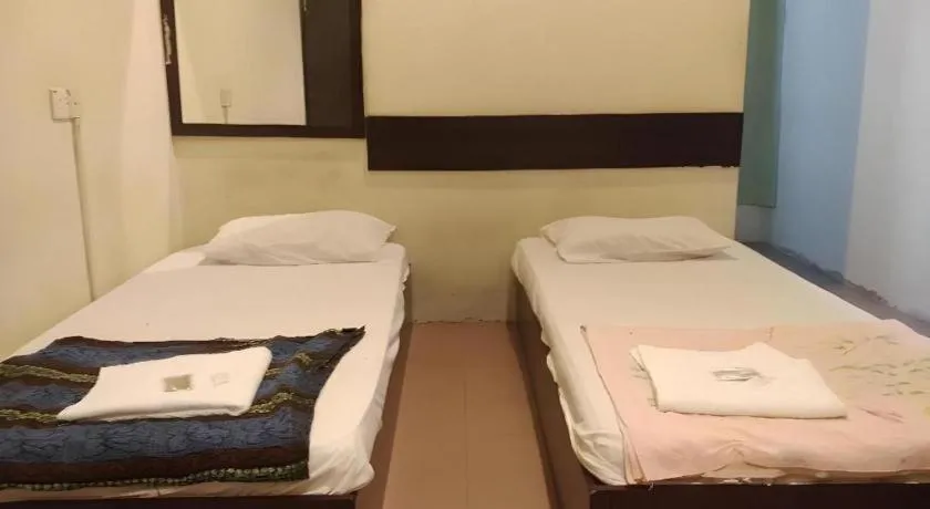 Bed in SPOT ON 91178 Motel Impian