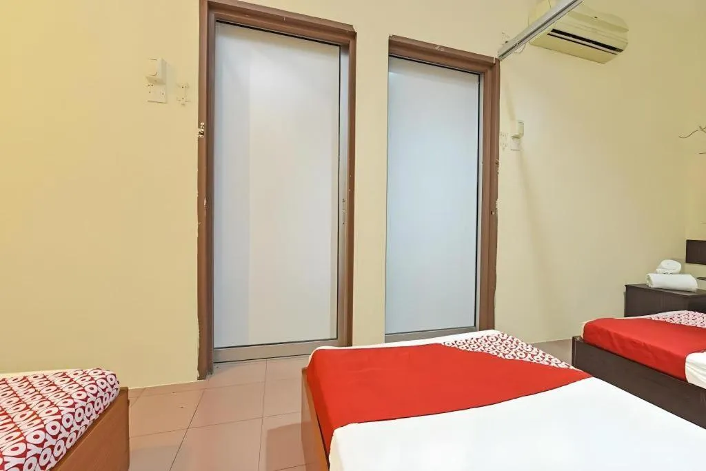 Bed in SPOT ON 91178 Motel Impian