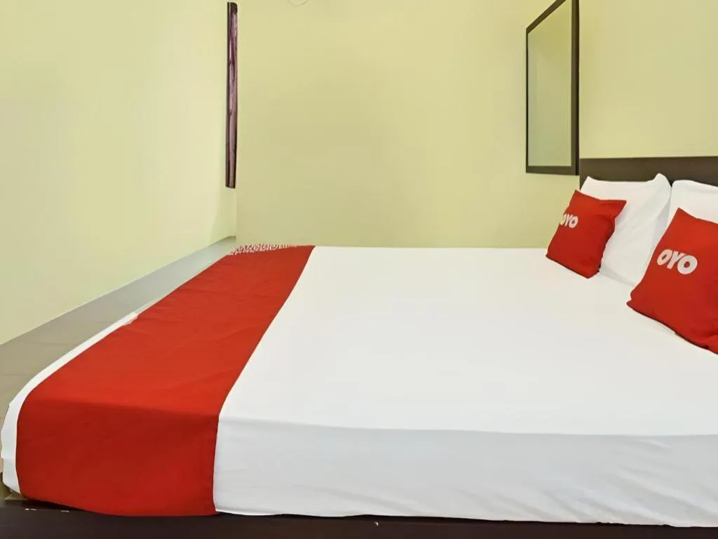 Bed in SPOT ON 91178 Motel Impian