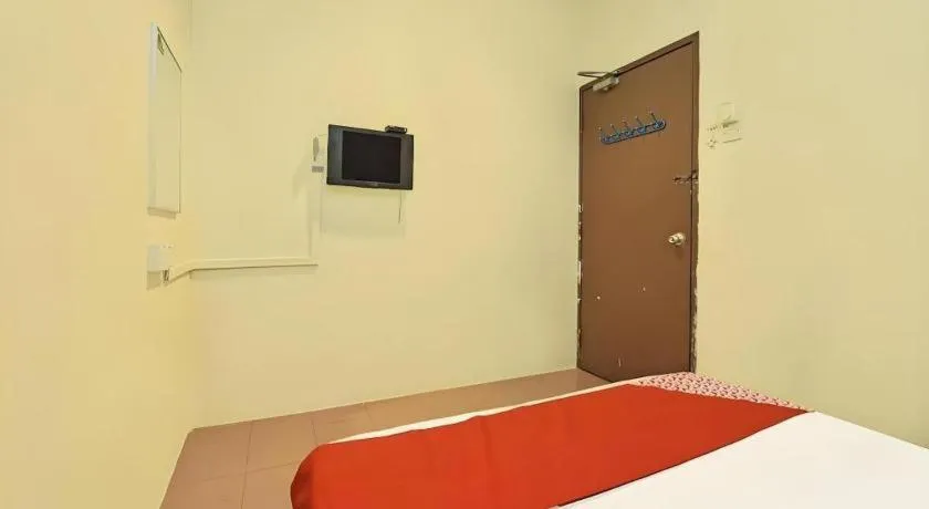 Bed in SPOT ON 91178 Motel Impian