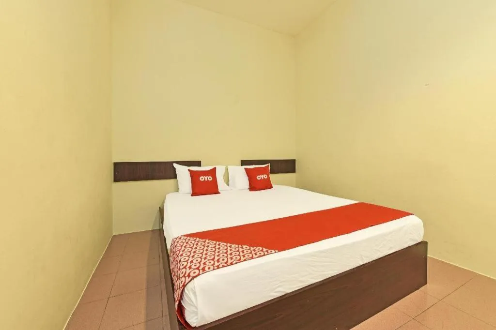 Bed in SPOT ON 91178 Motel Impian