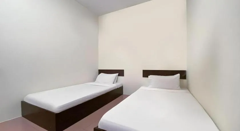 Bed in SPOT ON 91178 Motel Impian