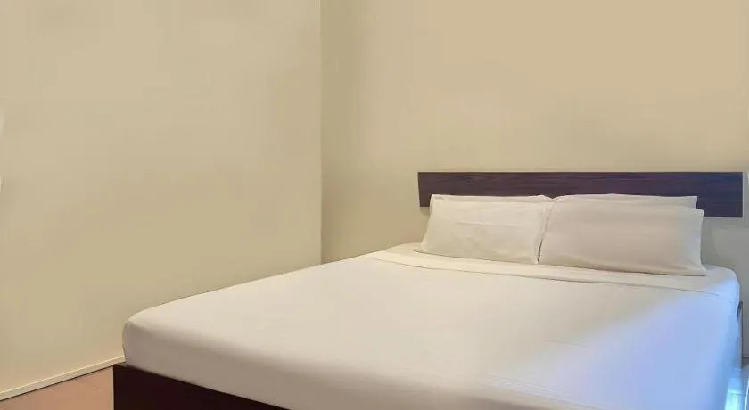 Bed in SPOT ON 91178 Motel Impian