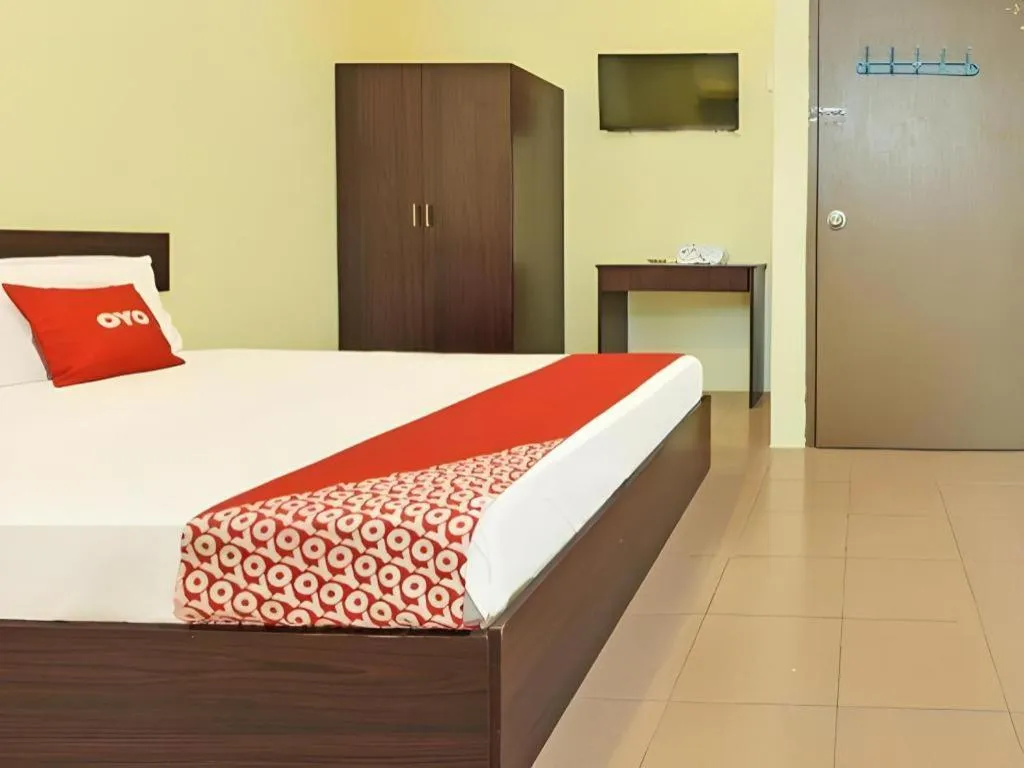 Bed in SPOT ON 91178 Motel Impian