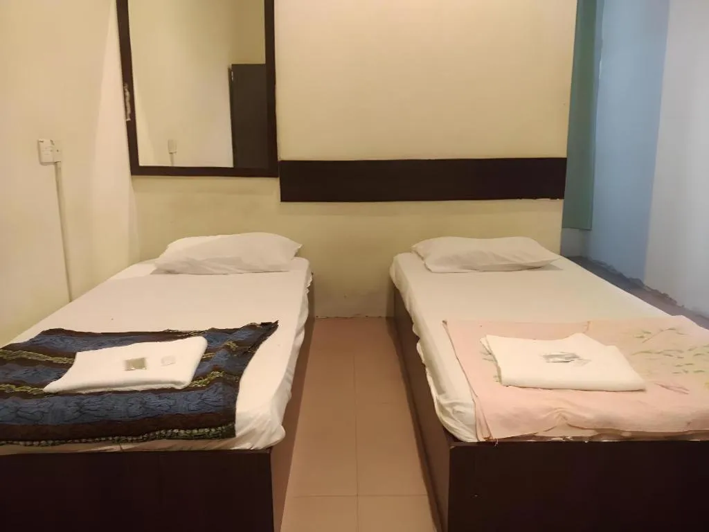 Bed in SPOT ON 91178 Motel Impian