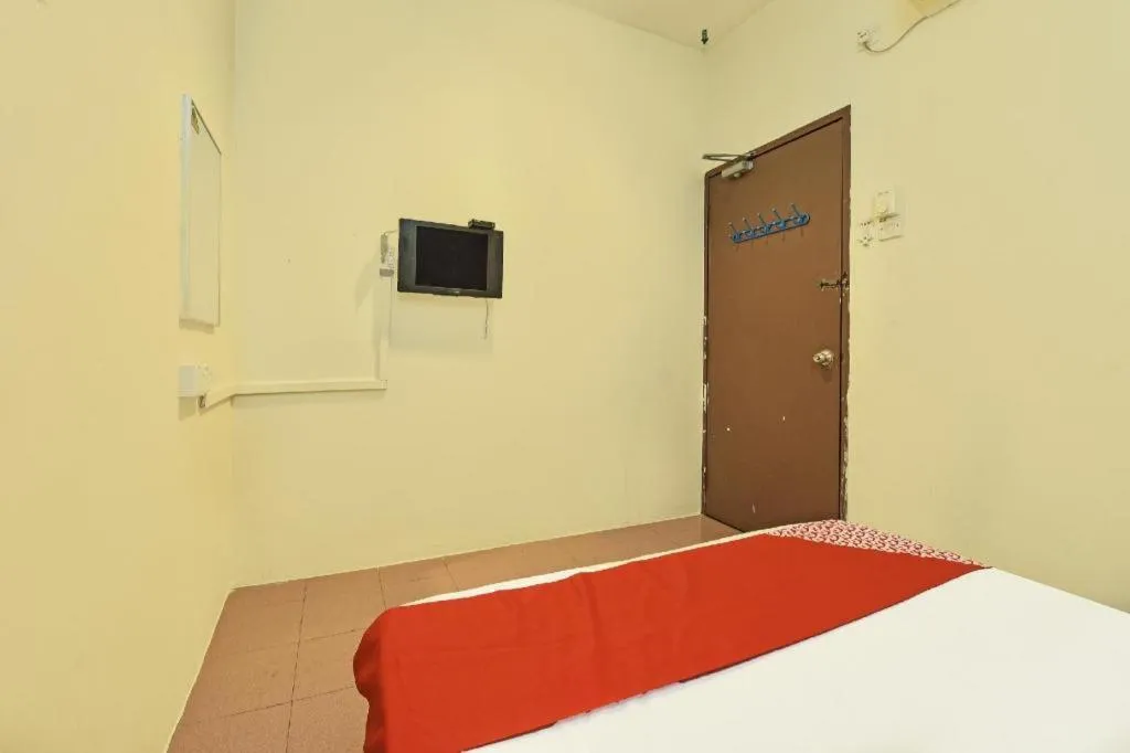 Bed in SPOT ON 91178 Motel Impian