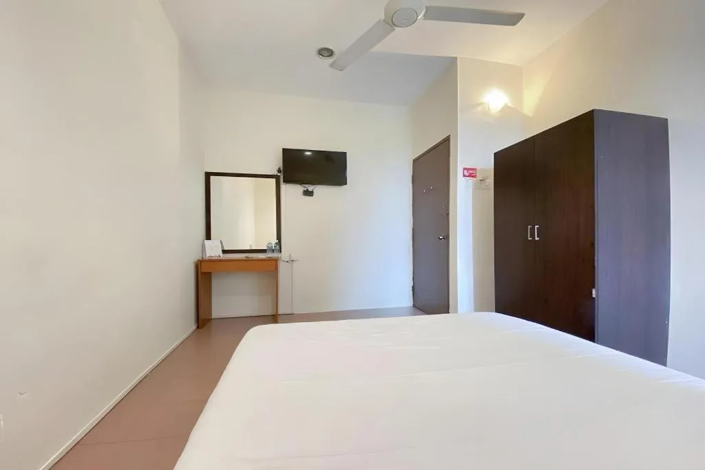 Bed in SPOT ON 91178 Motel Impian