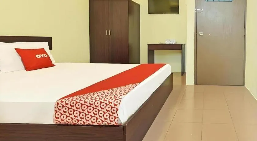 Bed in SPOT ON 91178 Motel Impian