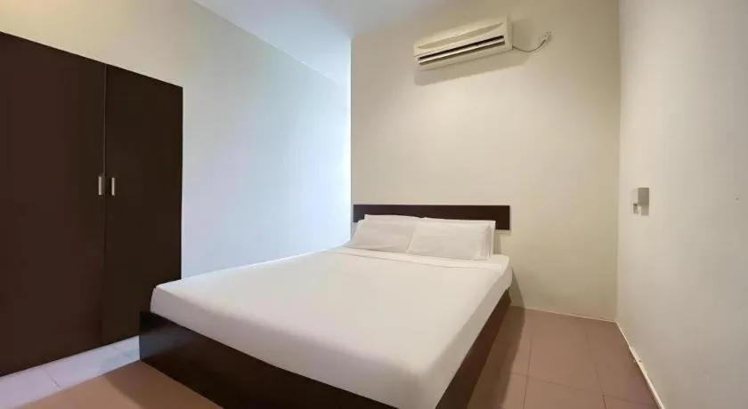 Bed in SPOT ON 91178 Motel Impian