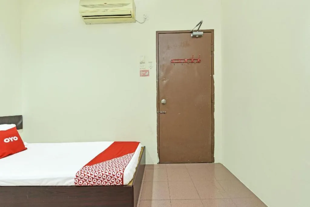 Bed in SPOT ON 91178 Motel Impian